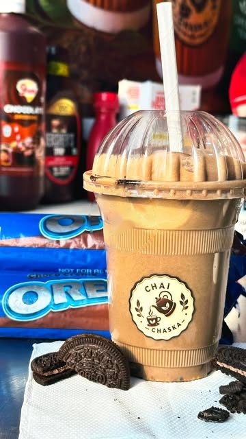 Chai Chaska reel thumbnail: Oreo shake in a branded cup on the café counter at Gaur City Centre
